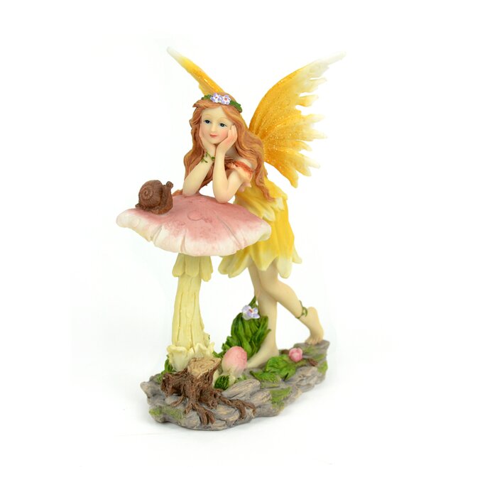 fairy on mushroom statue